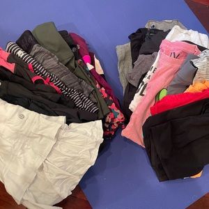 Lot of women’s workout clothes - Lululemon, Athleta and more